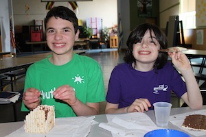 Jesse and David make matzah pyramids